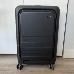 Monos Black 23” Pro Plus Spinner Carry On Luggage